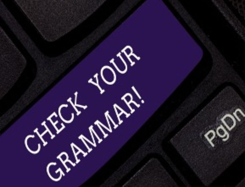 editing-services-check-your-grammar-purple-button-min
